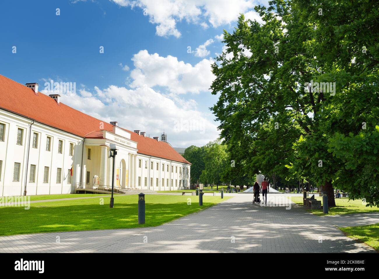 VILNIUS, LITHUANIA - JULY 14, 2020: People walking down the streets of Vilnius Old Town. Beautiful sunny summer day in the capital of Lithuania. Stock Photo