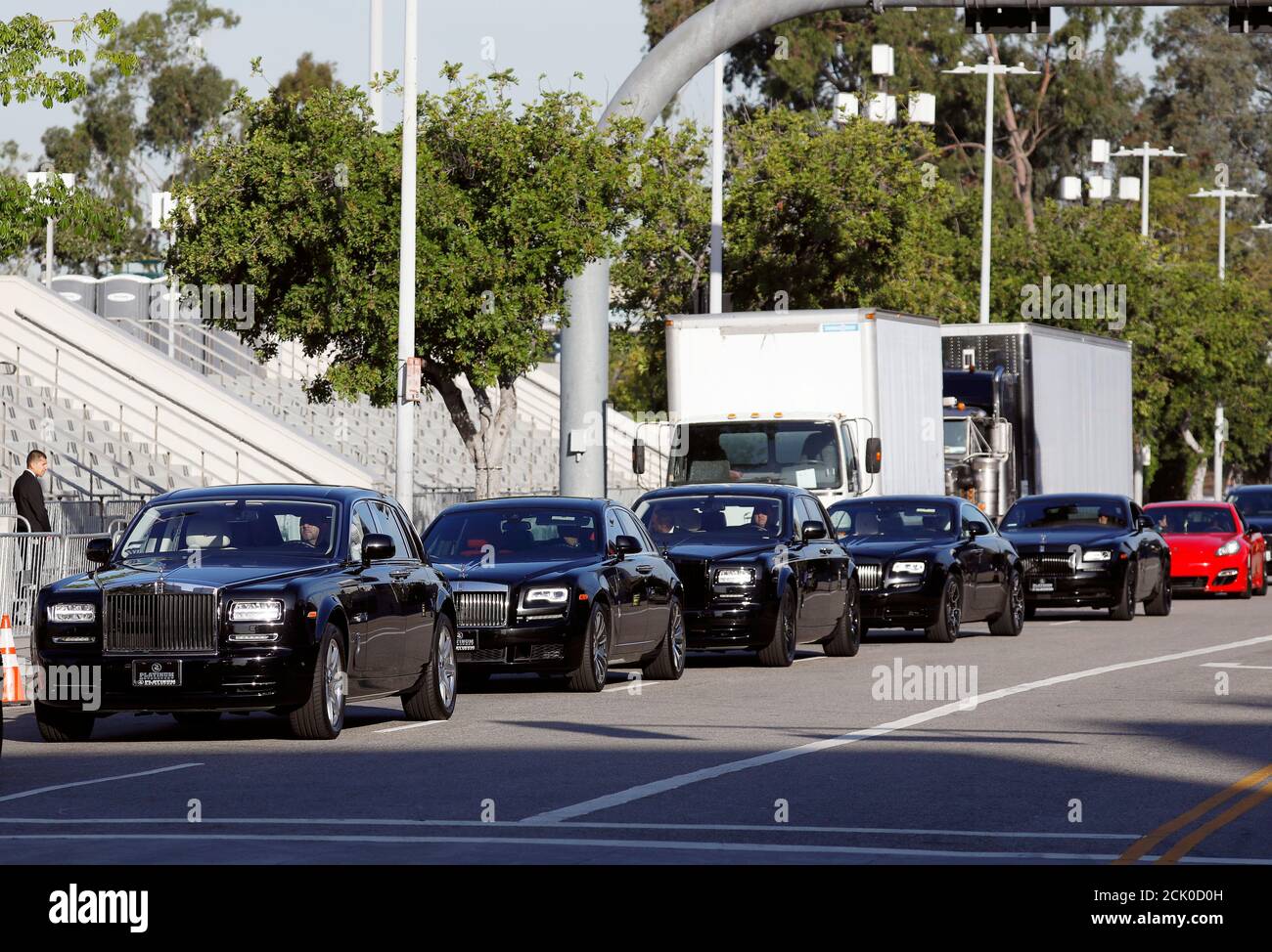A motorcade arrives at Staples Center ahead of a memorial for rapper Nipsey Hussle in Los Angeles, California, April 11, 2019.  REUTERS/Patrick T. Fallon Stock Photo