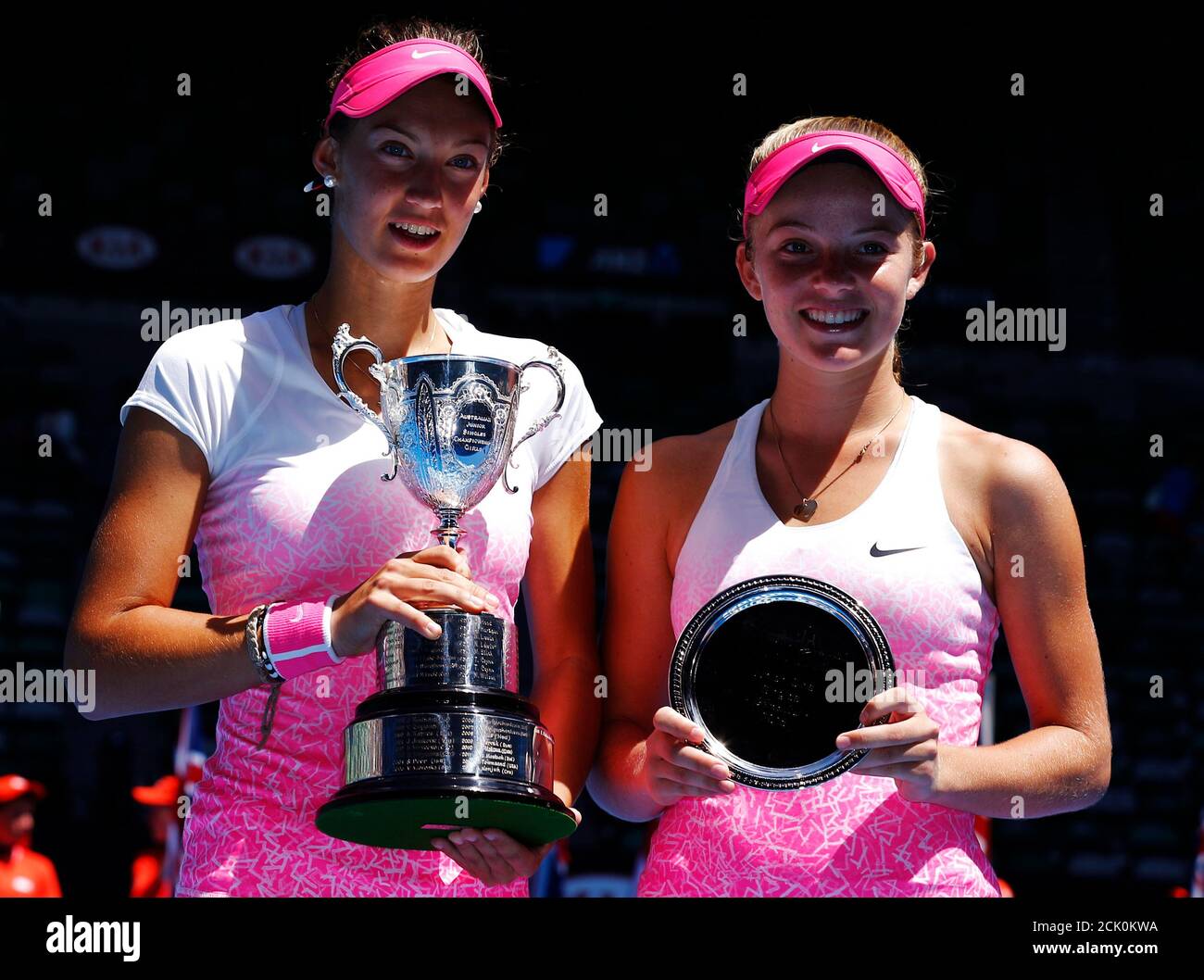 Tereza Mihalikova (L) of Slovakia and Katie Swan of Britain pose with their trophies after their junior girls' singles final match at the Australian Open 2015 tennis tournament in Melbourne January 31, 2015.  REUTERS/Thomas Peter (AUSTRALIA  - Tags: SPORT TENNIS) Stock Photo