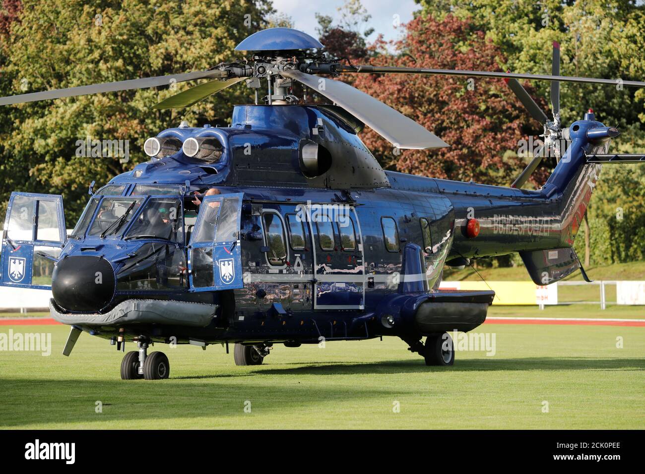 The Super Puma helicopter of Germany's federal police Bundespolizei carries  German Chancellor Angela Merkel, a top candidate of the Christian  Democratic Union Party (CDU) for the upcoming general elections, following  an election
