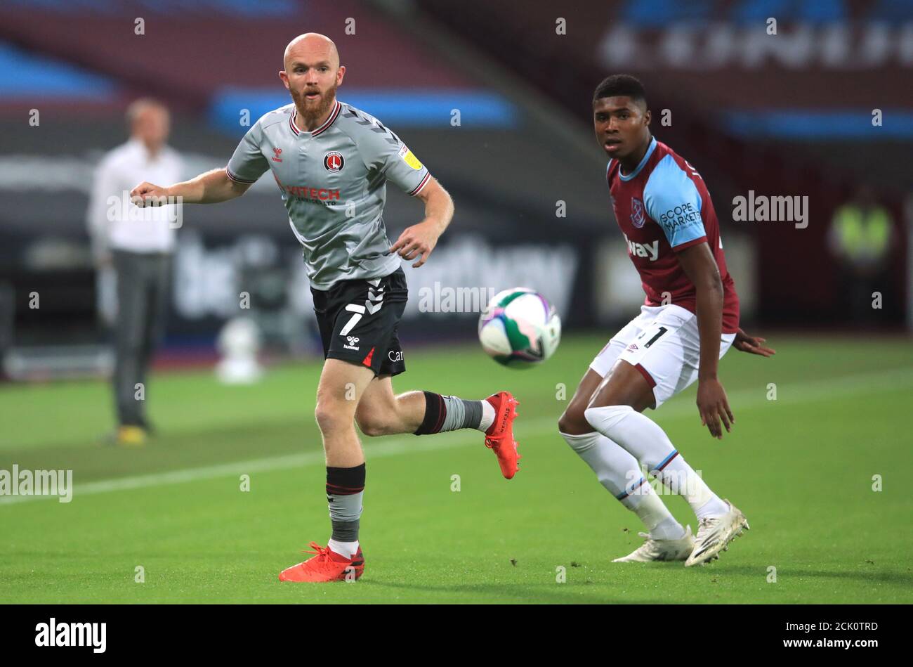 Charlton Athletic S Jonathan Williams Left And West Ham United S Ben Johnson Battle For The Ball During The Carabao Cup Second Round Match At The London Stadium Stock Photo Alamy