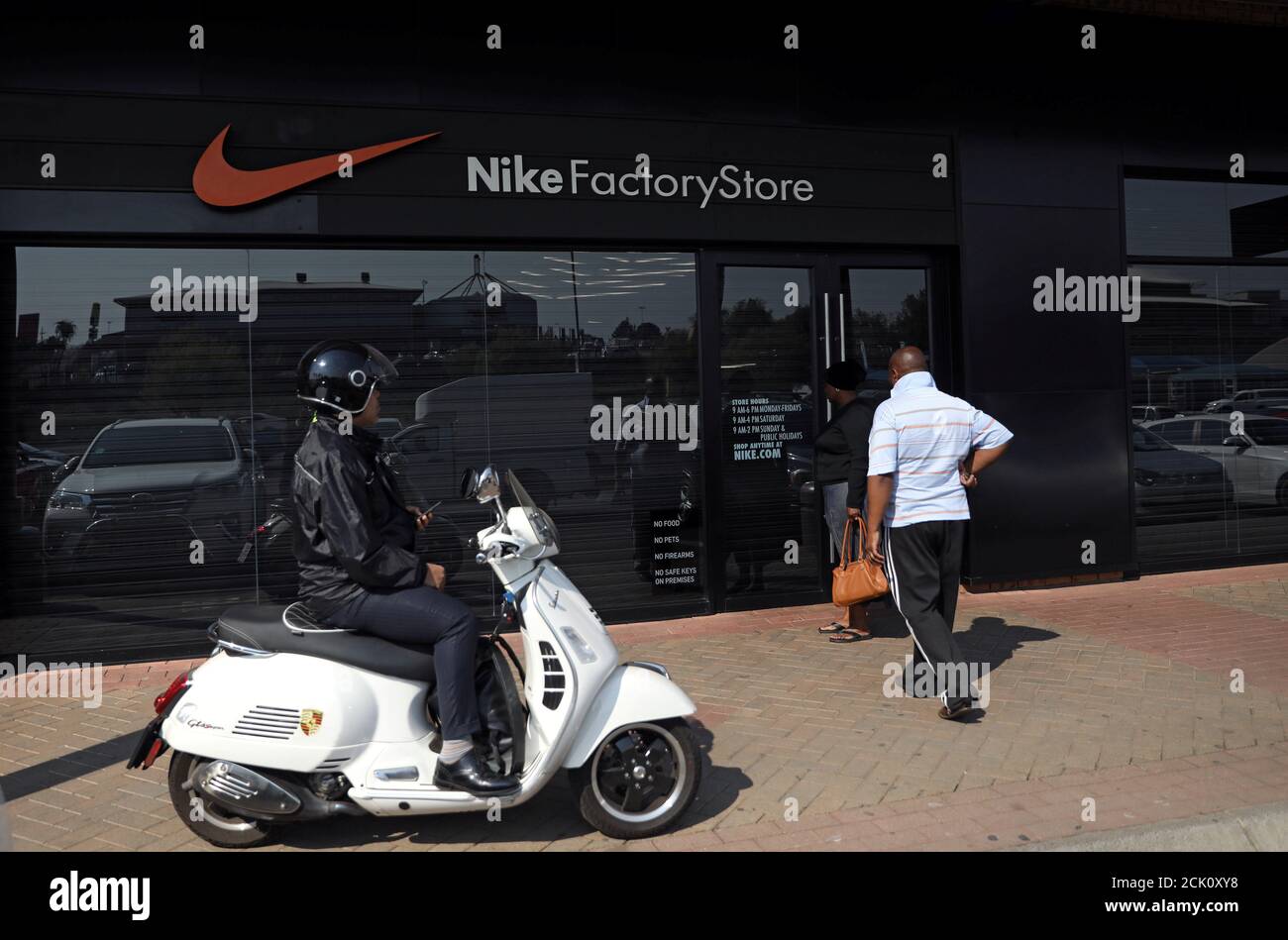 A man reacts as he finds a Nike store closed in Johannesburg, South Africa,  August 22, 2018. REUTERS/Siphiwe Sibeko Stock Photo - Alamy