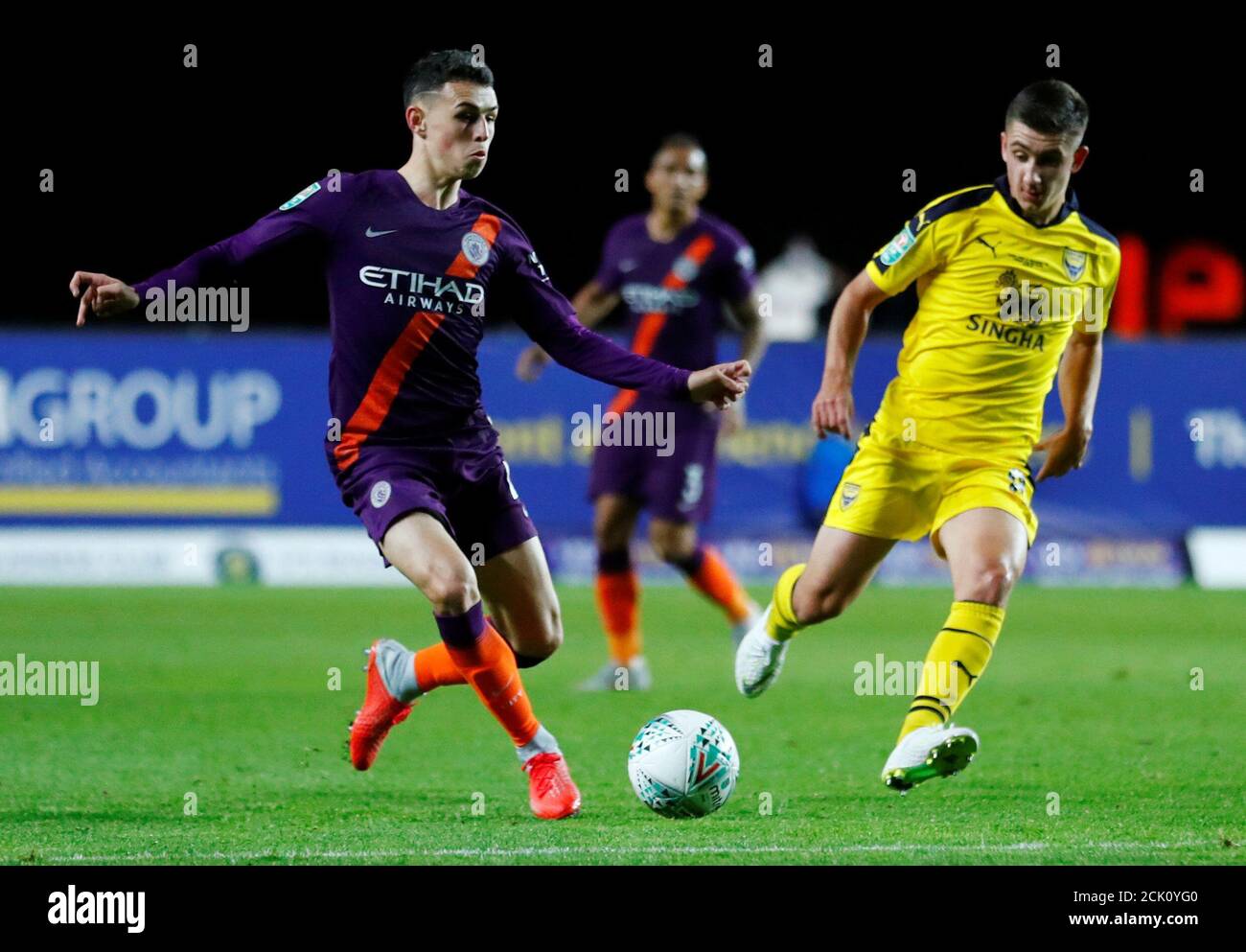 Soccer Football - Carabao Cup - Third Round - Oxford United v Manchester City - Kassam Stadium, Oxford, Britain - September 25, 2018  Manchester City's Phil Foden in action with Oxford United's Cameron Brannagan   REUTERS/Eddie Keogh  EDITORIAL USE ONLY. No use with unauthorized audio, video, data, fixture lists, club/league logos or 'live' services. Online in-match use limited to 75 images, no video emulation. No use in betting, games or single club/league/player publications.  Please contact your account representative for further details. Stock Photo