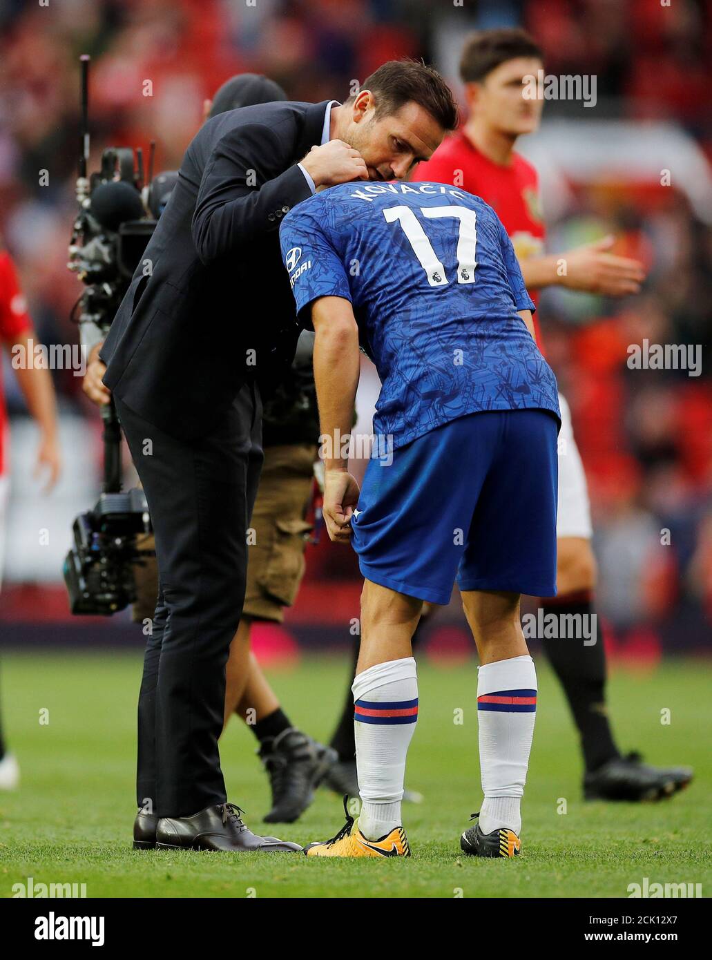 Soccer Football - Premier League - Manchester United v Chelsea - Old Trafford, Manchester, Britain - August 11, 2019  Chelsea manager Frank Lampard comforts Mateo Kovacic at the end of the match      REUTERS/Phil Noble  EDITORIAL USE ONLY. No use with unauthorized audio, video, data, fixture lists, club/league logos or 'live' services. Online in-match use limited to 75 images, no video emulation. No use in betting, games or single club/league/player publications.  Please contact your account representative for further details. Stock Photo