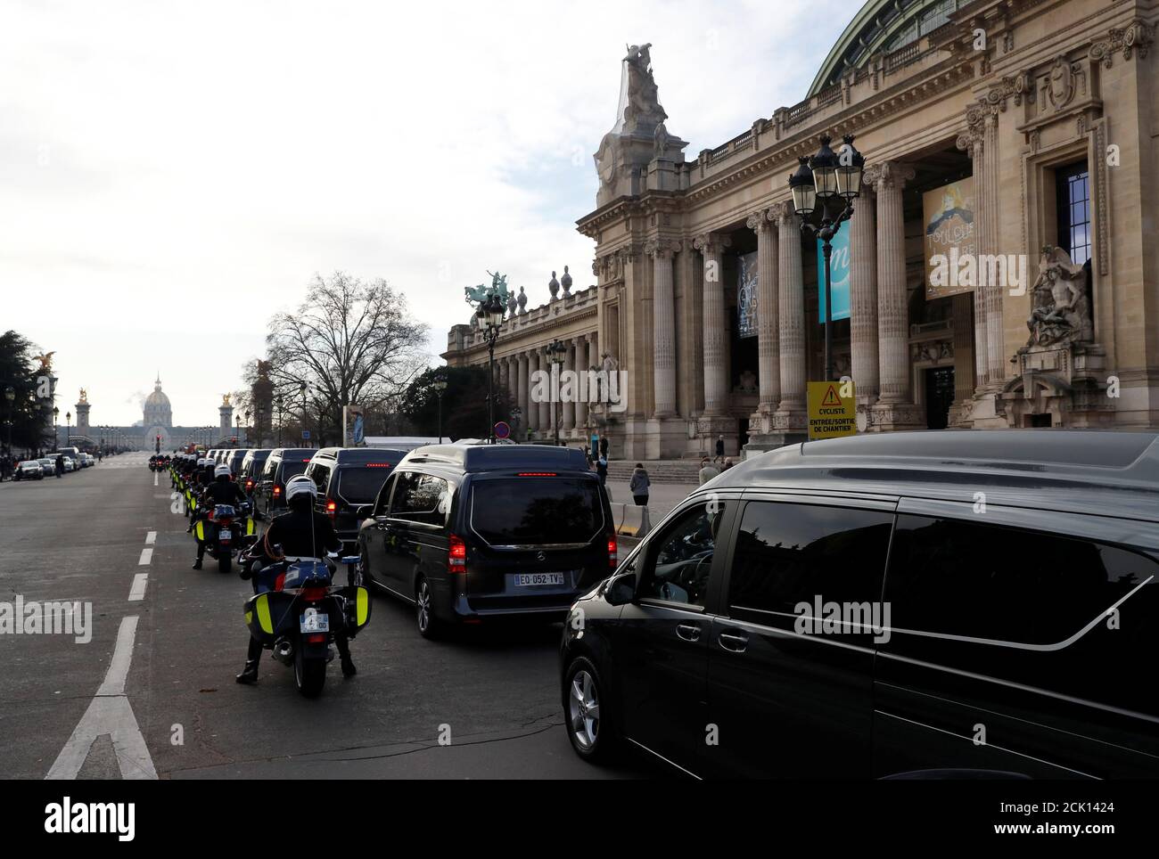 The hearses with the coffins of late thirteen French soldiers killed in Mali stand in front of the Grand Palais during a funeral convoy before a ceremony at the Hotel National des Invalides in Paris, France, December 2, 2019. French soldiers Julien Carrette, Benjamin Gireud, Romain Salles de Saint-Paul, Clement Frison-Roche, Nicolas Megard, Romain Chomel de Jarnieu, Pierre Bockel, Alex Morisse, Jeremy Leusie, Alexandre Protin, Antoine Serre, Valentin Duval, Andrei Jouk died in Mali when their helicopters collided in the dark last week as they hunted for Islamist militants.   REUTERS/Gonzalo Fu Stock Photo