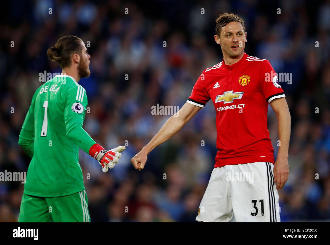 Soccer Football - Premier League - Brighton & Hove Albion v Manchester United - The American Express Community Stadium, Brighton, Britain - May 4, 2018 Manchester United's Nemanja Matic congratulates David De Gea after making a save REUTERS/Eddie Keogh EDITORIAL USE ONLY. No use with unauthorized audio, video, data, fixture lists, club/league logos or "live" services. Online in-match use limited to 75 images, no video emulation. No use in betting, games or single club/league/player publications. Please contact your account representative for further details. Stock Photo