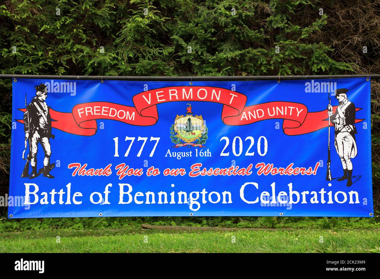 A blue banner commemorating the Battle of Bennington and Thanks for the essential workers at Bennington Battle Monument.Bennington.Vermont.USA Stock Photo