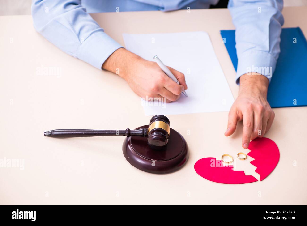 Young man in the courthouse in divorcing concept Stock Photo
