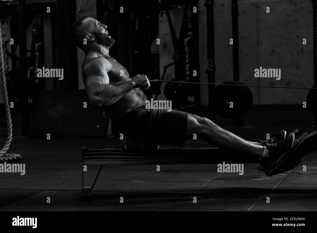 black and white photo tensed body of bodybuilder during workout. heath concept Stock Photo