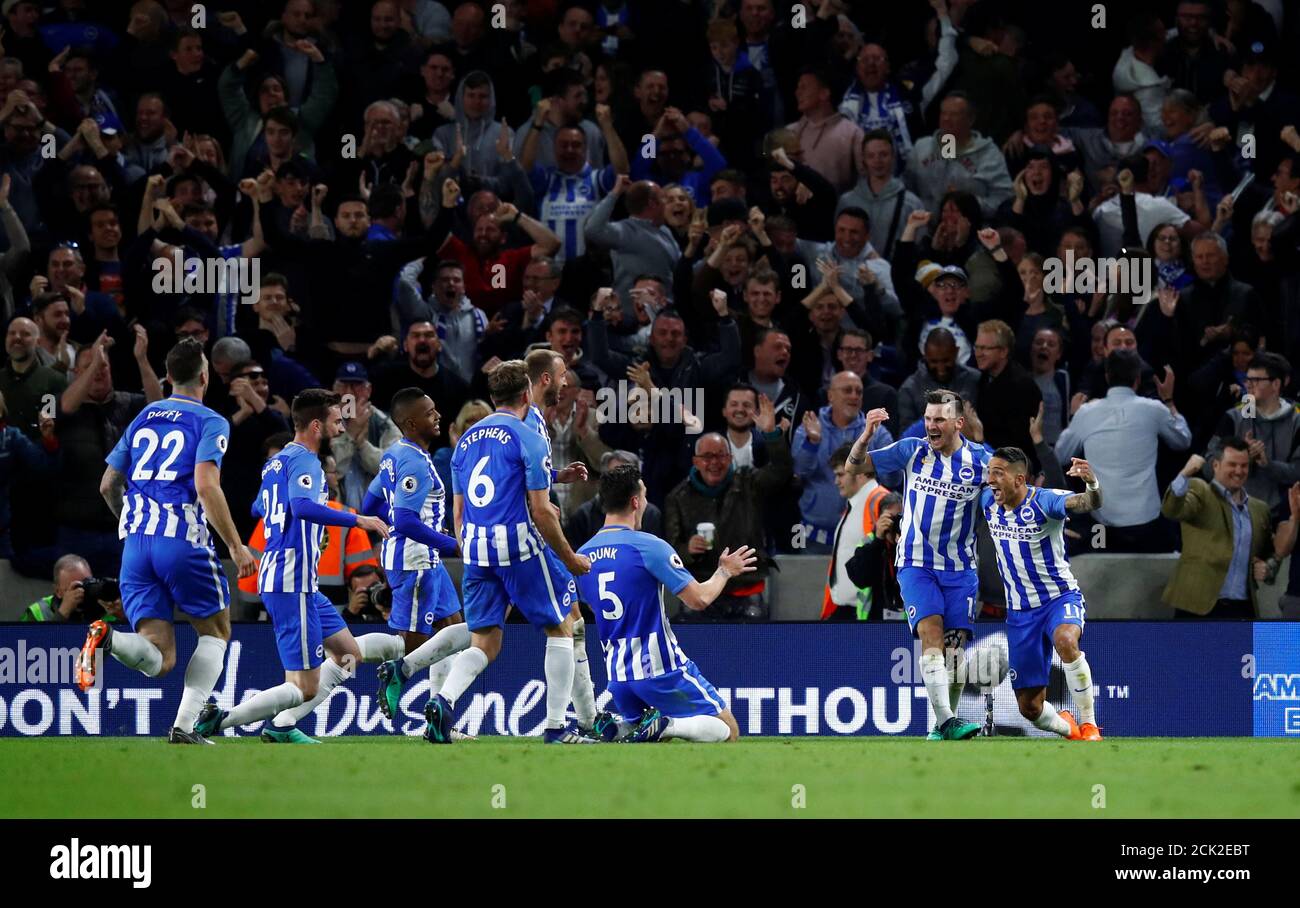 Soccer Football - Premier League - Brighton & Hove Albion v Manchester United - The American Express Community Stadium, Brighton, Britain - May 4, 2018 Brighton's Pascal Gross celebrates scoring their first goal with teammates REUTERS/Eddie Keogh EDITORIAL USE ONLY. No use with unauthorized audio, video, data, fixture lists, club/league logos or "live" services. Online in-match use limited to 75 images, no video emulation. No use in betting, games or single club/league/player publications. Please contact your account representative for further details. Stock Photo