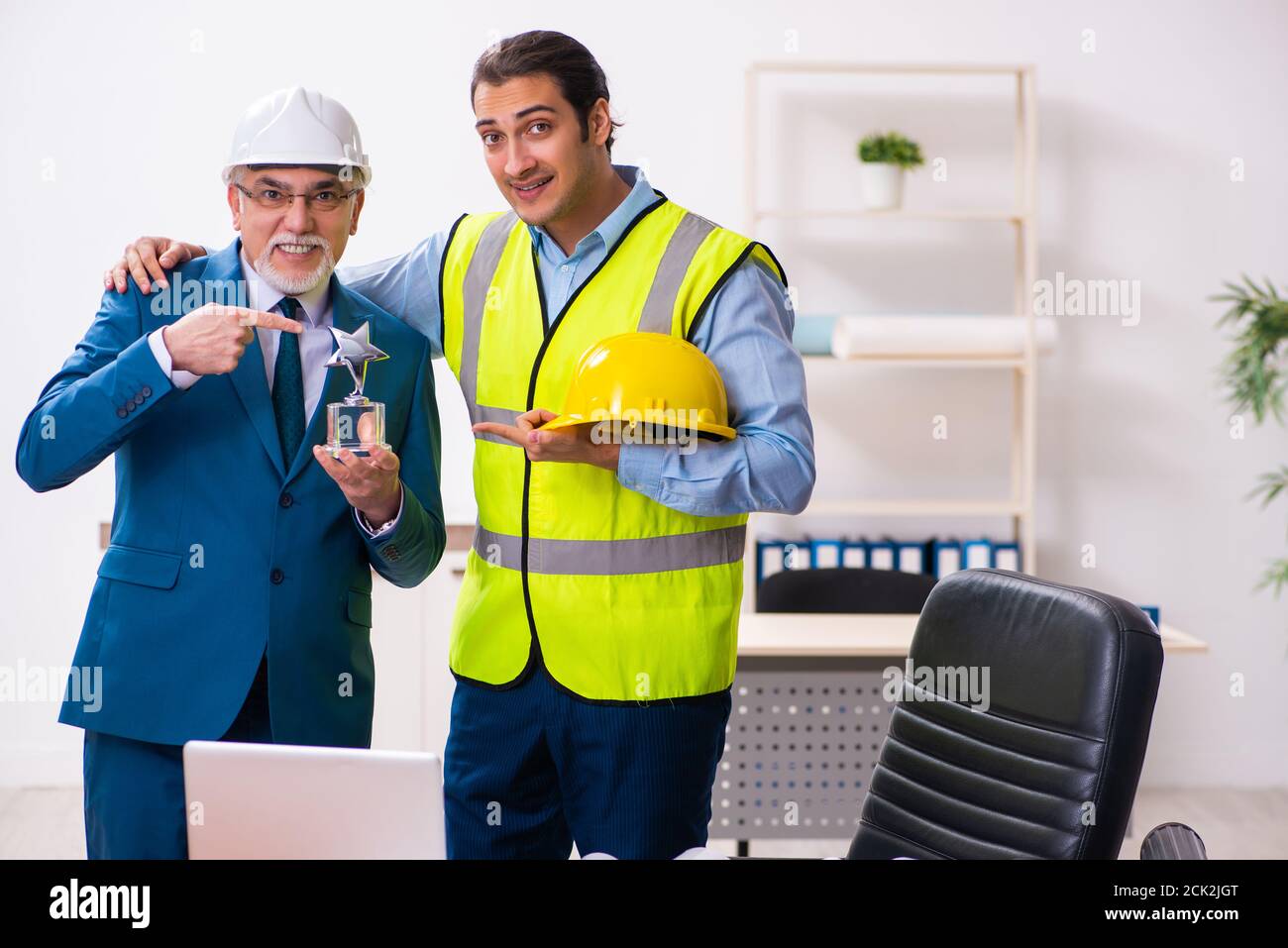 Two architects working in the office Stock Photo