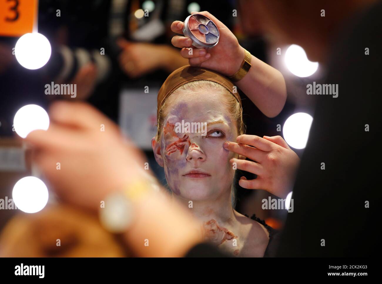 A model is made up as "Queen Elisabeth" by Janika Kreutzer of the Hasso von  Hugo makeup artist school in Berlin to win the the German make-up artist  championships in Duesseldorf, Germany,