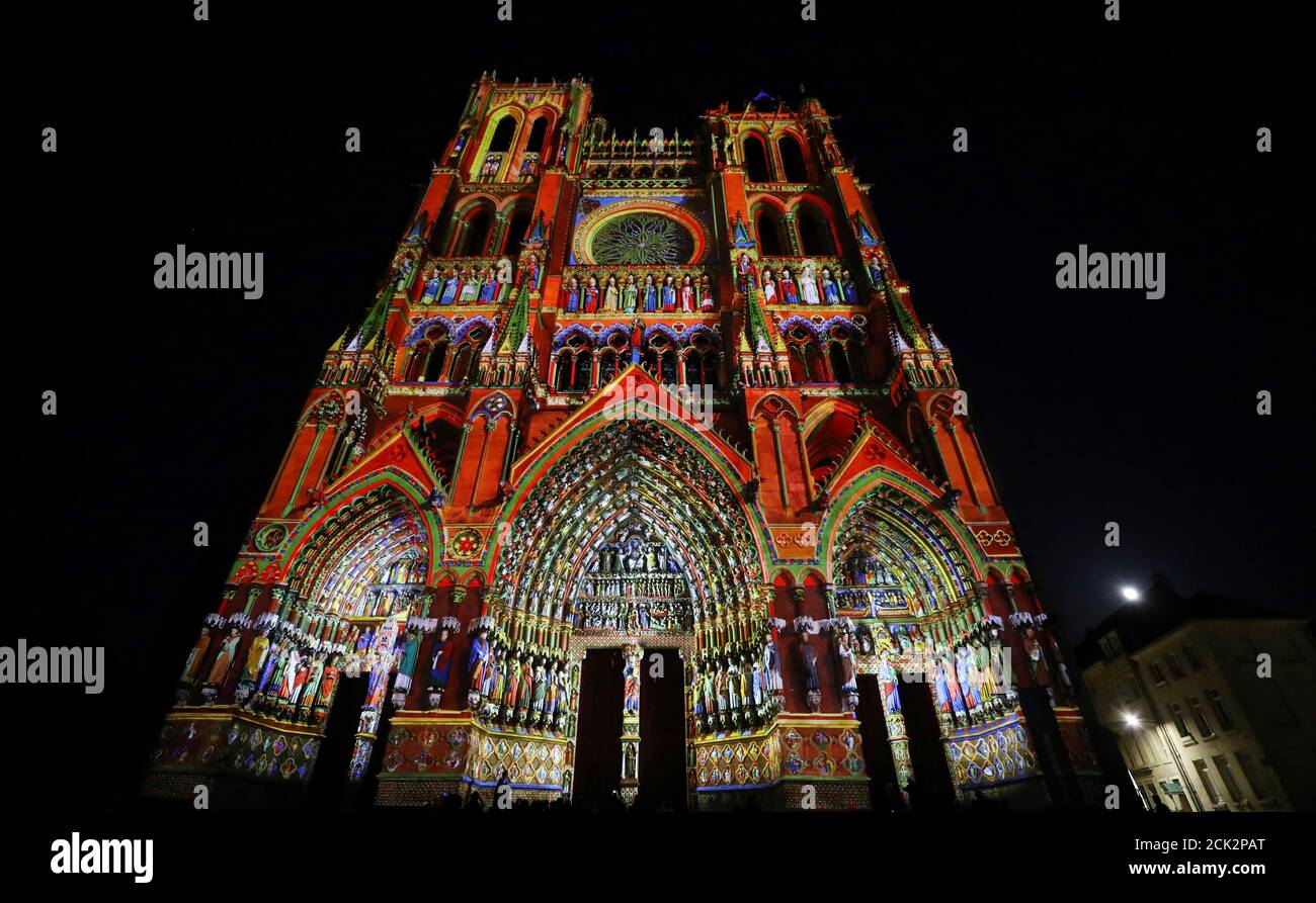The facade of the Cathedral of Notre-Dame d'Amiens is illuminated during a  light show in Amiens, France, June 16, 2019. REUTERS/Phil Noble Stock Photo  - Alamy