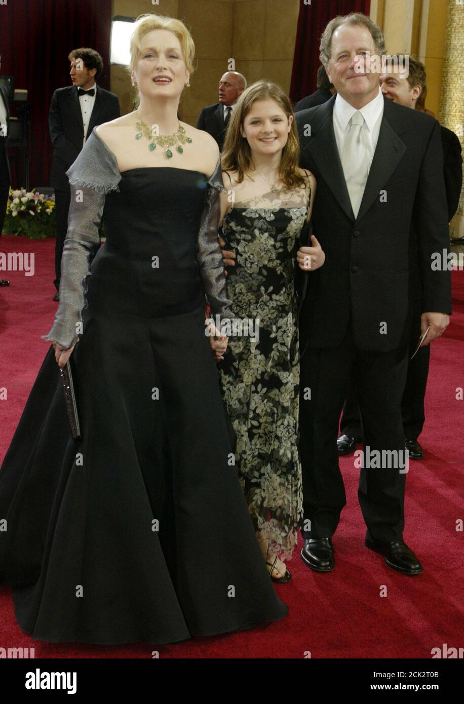 Actress Meryl Streep (L) arrives with her daughter Louisa (C) and her husband Donald Gummer at the 75th annual Academy Awards at the Kodak Theatre in Hollywood, California March 23, 2003. Streep's nomination for a best supporting actress Oscar for her role in 'Adaptation' makes her the most nominated performer in Academy history with 13. REUTERS/Fred Prouser  BS Stock Photo