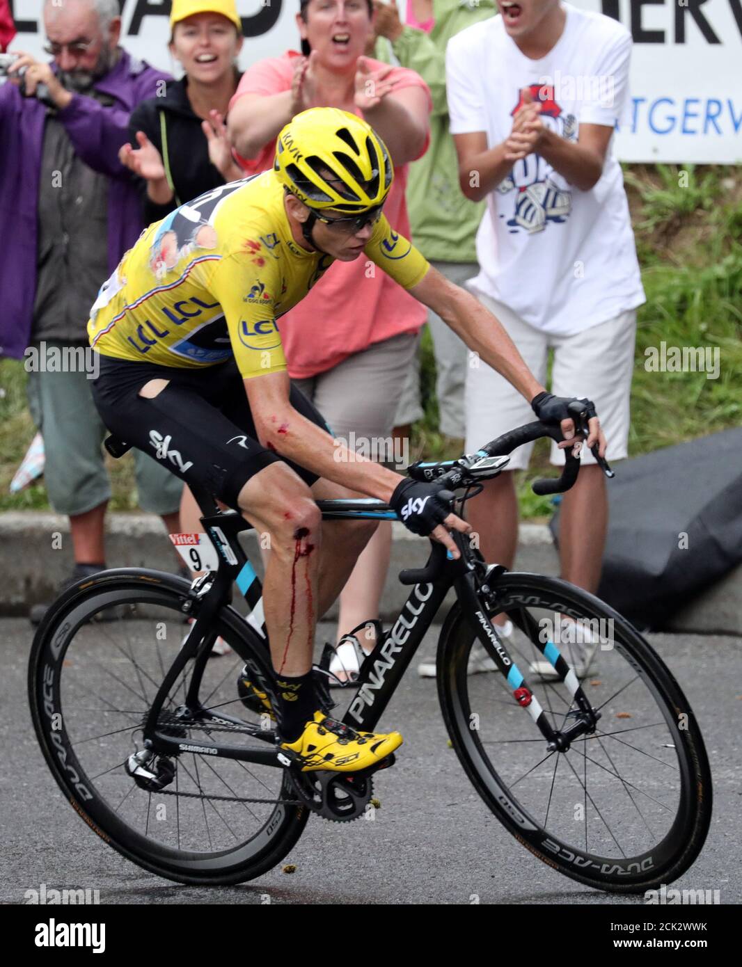 Cycling - Tour de France cycling race - The 146 km (90 miles) Stage 19 from Albertville to Saint-Gervais Mont Blanc, France - 22/07/2016  - Yellow jersey leader Team Sky rider Chris Froome of Britain rides after a fall during the stage.     REUTERS/Kenzo Tribouillard/Pool Stock Photo