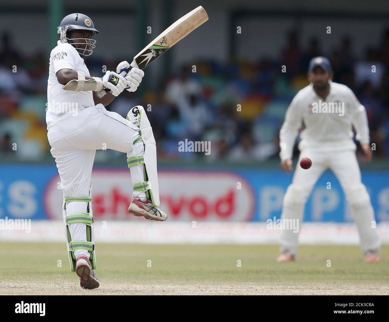 Sri Lanka's Rangana Herath hits a boundary during the third day of their third and final test cricket match against India in Colombo, August 30, 2015. REUTERS/Dinuka Liyanawatte Stock Photo