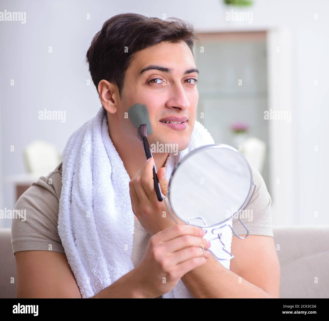 Man peeling off mask hi-res stock photography and images - Alamy