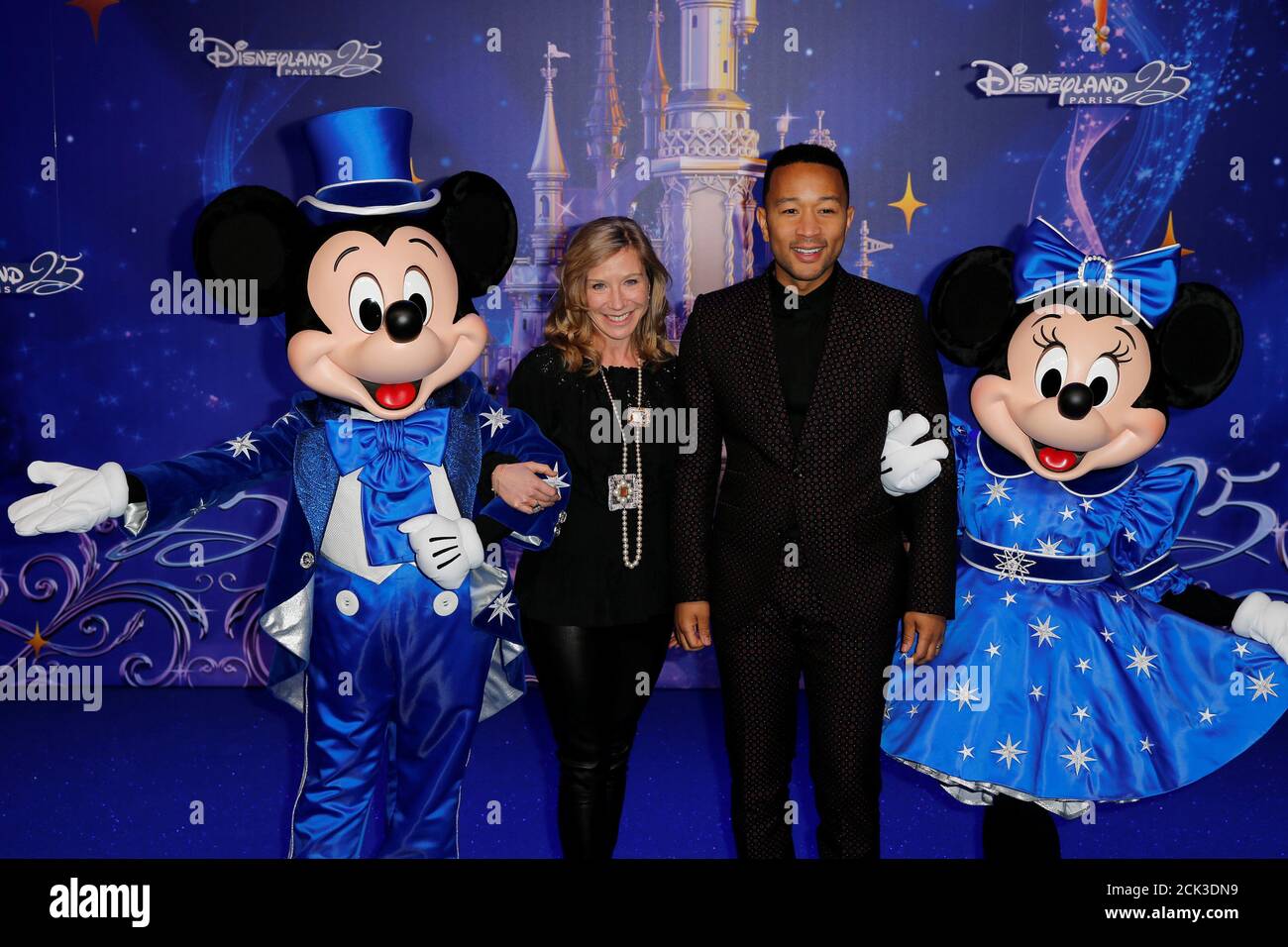 Euro Disney S A S President Catherine Powell And Recording Artist John Legend Pose For Photos During The 25th Anniversary Of Disneyland Paris At The Park In Marne La Vallee Near Paris France March 25 17 Euro Disney S A S President Catherine Powell And Recording Artist John Legend Pose For Photos During The 25th Anniversary Of Disneyland Paris At The Park In Marne La Vallee Near Paris France March 25 17