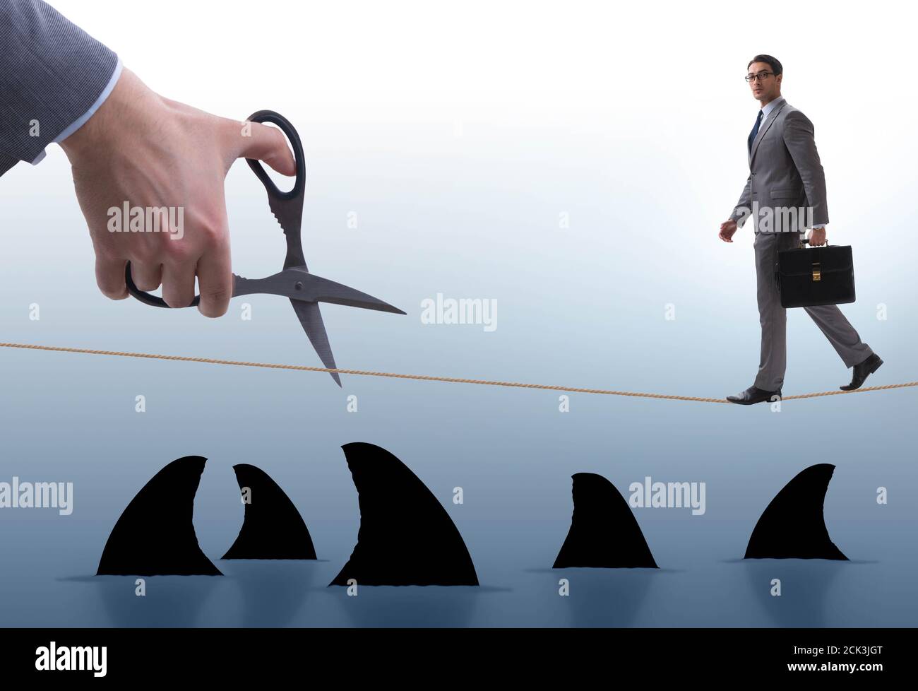 Hand cutting rope in business risk concept Stock Photo - Alamy