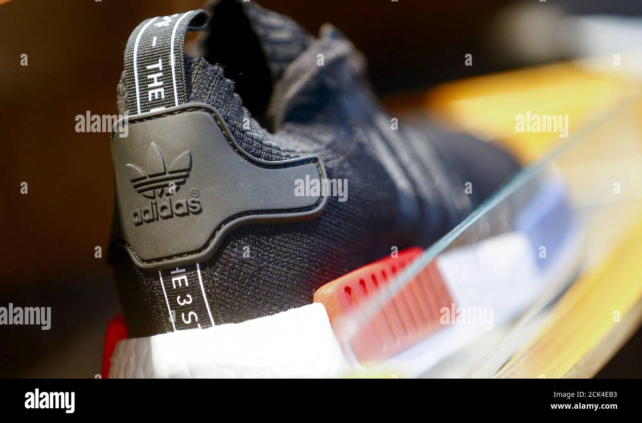 The new Adidas NMD model is pictured at the flagship store in Berlin,  Germany, January 20, 2016. A combination of new and retro sneaker styles  will keep driving growth at Adidas's fashion