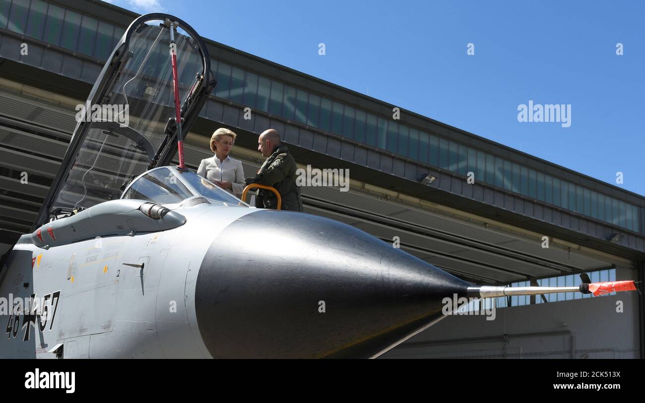 German Defence Minister Ursula von der Leyen inspects a Tornado aircraft during her visit at the Tactical Air Force Wing 51 'Immelmann' at German army Bundeswehr airbase in Jagel near the German-Danish border, August 17, 2016. REUTERS/Fabian Bimmer Stock Photo