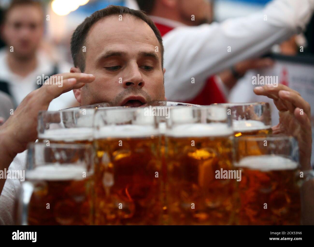 German Waiter Breaks Beer Carrying Record Video World News The Guardian