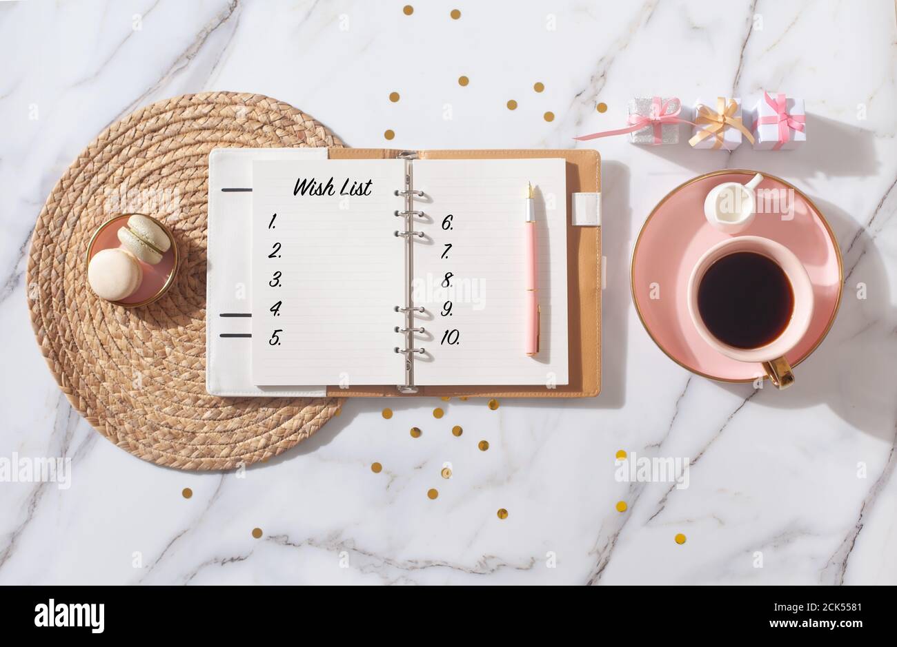 Flat lay composition with New Year's decoration, 2021 diary book with wish  list and coffee cup Stock Photo - Alamy