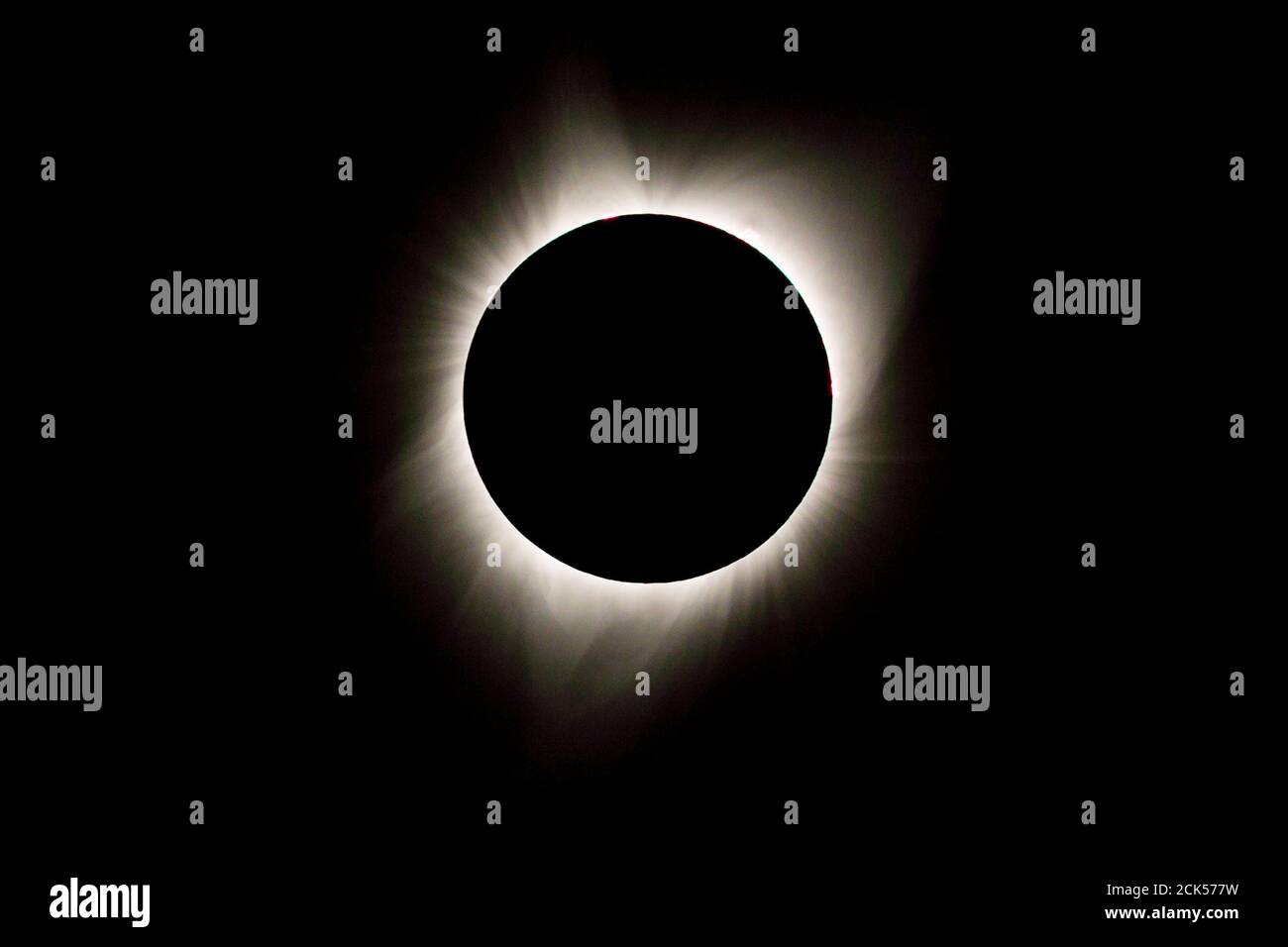 The sun's corona envelops the moon in this total solar eclipse viewed from Oregon, USA. Stock Photo