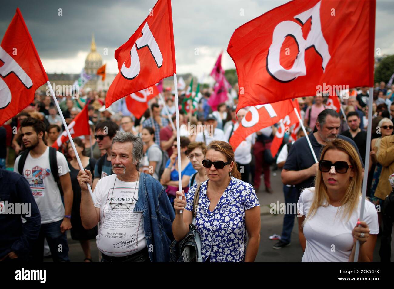 People attend a French unions gathering to protest work precariousness as France's new parliament will sit for the first time at the Invalides square in Paris, France June 27, 2017. REUTERS/Gonzalo Fuentes Stock Photo
