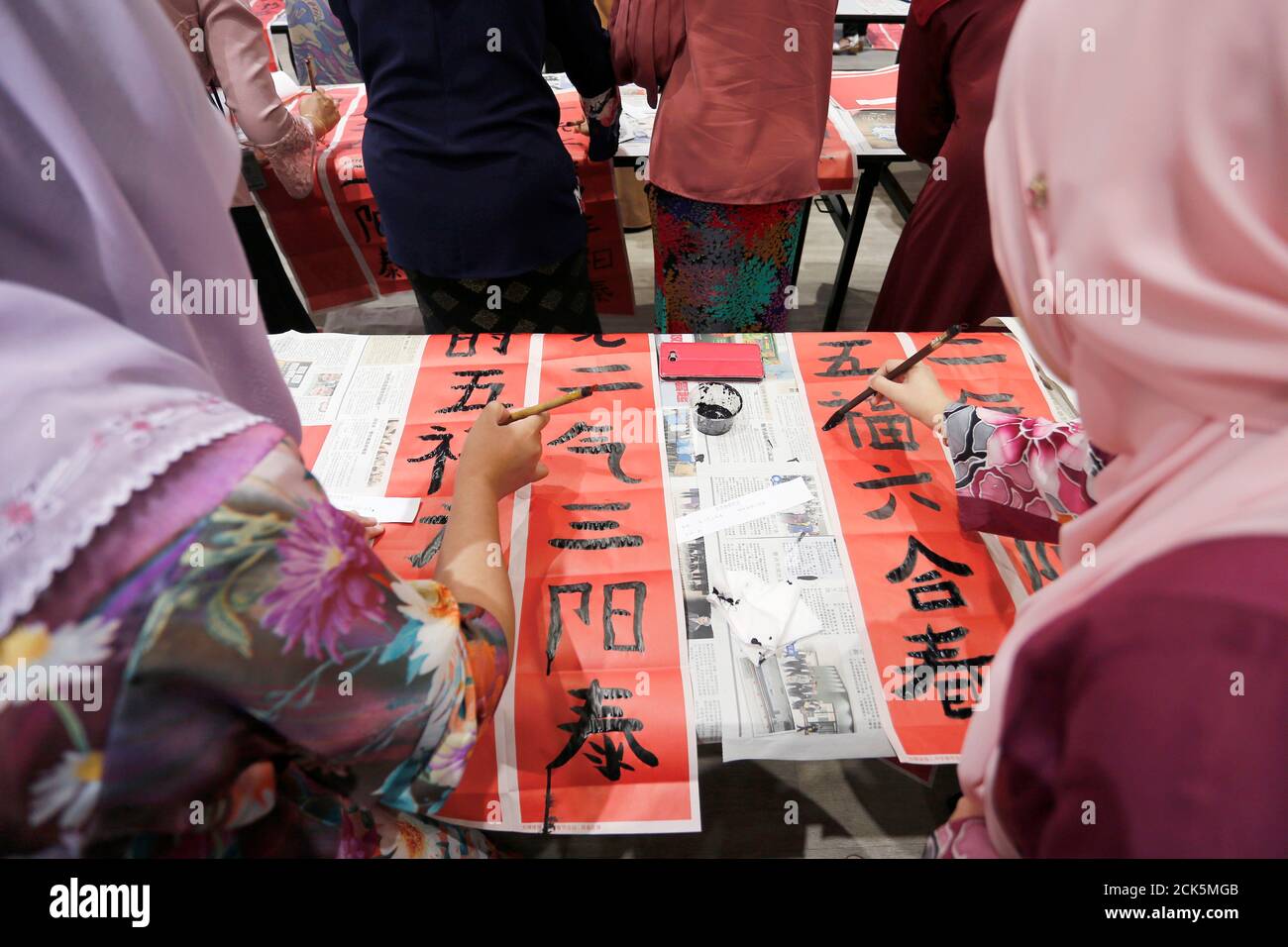 Malay Teachers Participate In A Chinese Calligraphy Event In Conjunction With The Upcoming Chinese Lunar New Year Of The Pig At Tsun Jin High School In Kuala Lumpur Malaysia January 18 2019