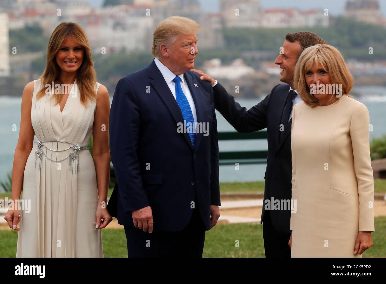 French President Emmanuel Macron and his wife Brigitte Macron welcome U ...