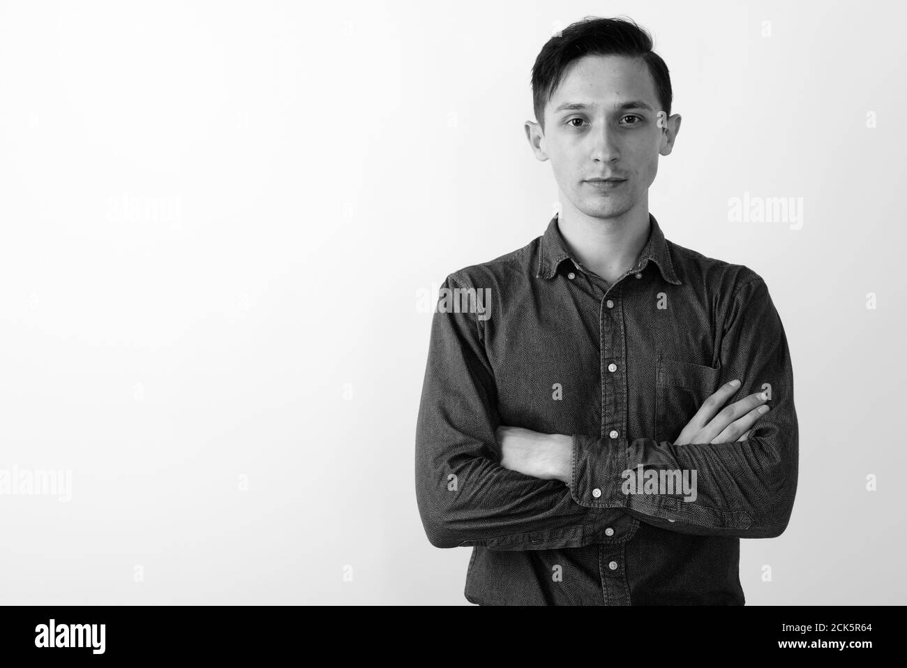 White background arms crossed Black and White Stock Photos & Images - Alamy