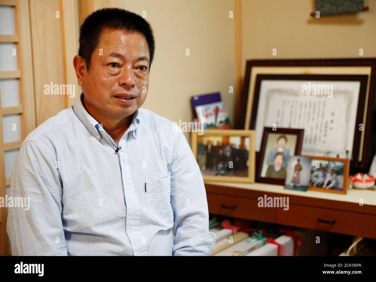 Masaaki Kimura, 63, speaks to Reuters about the loss of his wife Takoko, his mother, mother-in-law and his uncle to the 2011 tsunami, at his home in Unosumai, Japan September 24, 2019. Masaaki plans to watch the Rugby World Cup matches at Kamaishi stadium which was built on the former site of two schools that were destroyed by the 2011 tsunami. Masaaki lost his wife who was a schoolteacher in one of the schools that day.  REUTERS/Edgar Su Stock Photo