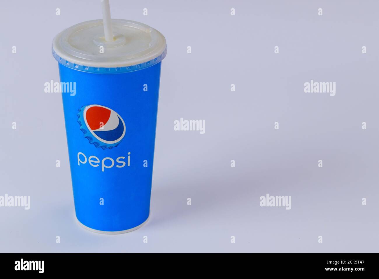 CLEWELAND OH US 15 SEPTEMBER 2020: A Pepsi paper disposable cup with paper straw a world famous carbonated soft drink, Illustrative editorial Stock Photo
