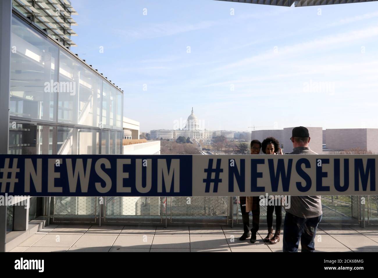 Patrons visit the Newseum during its last week of operation before closing the museum, dedicated to news gathering and the First Amendment, in Washington, U.S. December 26, 2019. According to the Newseum website, they will close at the end of 2019 and place many of their artifacts in storage because “remaining in the current location has proved to be financially unsustainable.” REUTERS/Jonathan Ernst Stock Photo