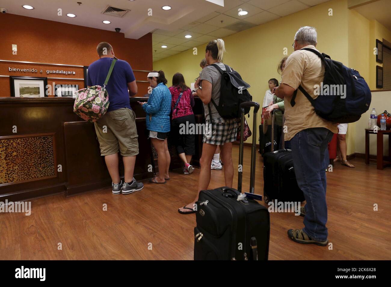 Tourists arriving from Puerto Vallarta are pictured at a hotel in Guadalajara, Mexico October 23, 2015. Hurricane Patricia, one of the most powerful storms on record, struck Mexico's Pacific coast on Friday with destructive winds that tore down trees, moved cars and forced thousands of people to flee homes and beachfront resorts. With winds of 160 miles per hour (266 km per hour), the Category 5 hurricane had western Mexico on high alert, with the popular resort of Puerto Vallarta and others on the coast opening emergency shelters as hotels were closed. REUTERS/Edgard Garrido Stock Photo