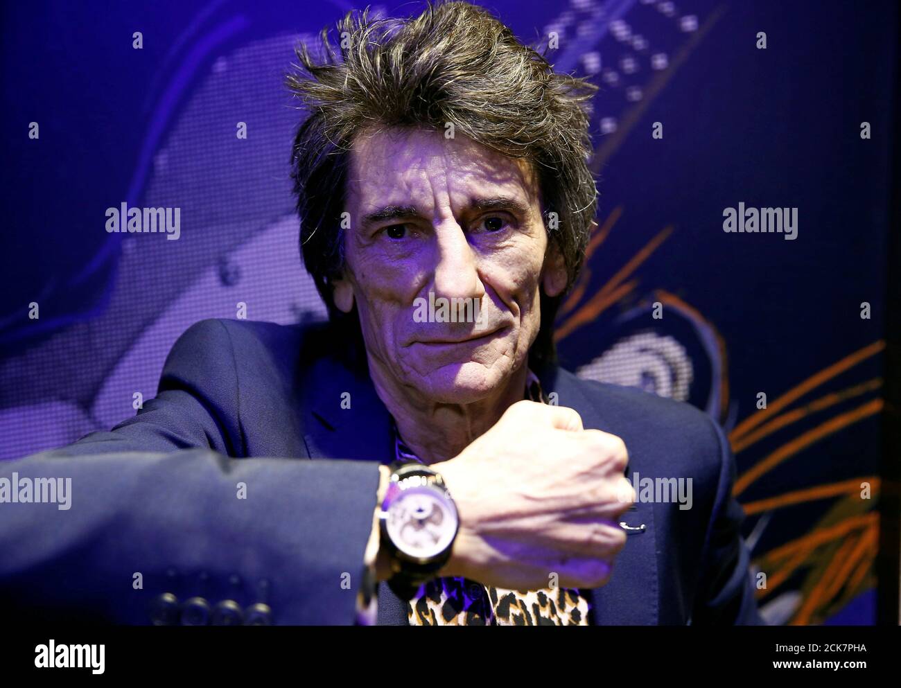 Ronnie Wood of the Rolling Stones poses with one of the 47 limited edition watches he designed in collaboration with Bremont, during a launch event at a watch shop in London, Britain November 14, 2019. REUTERS/Henry Nicholls Stock Photo