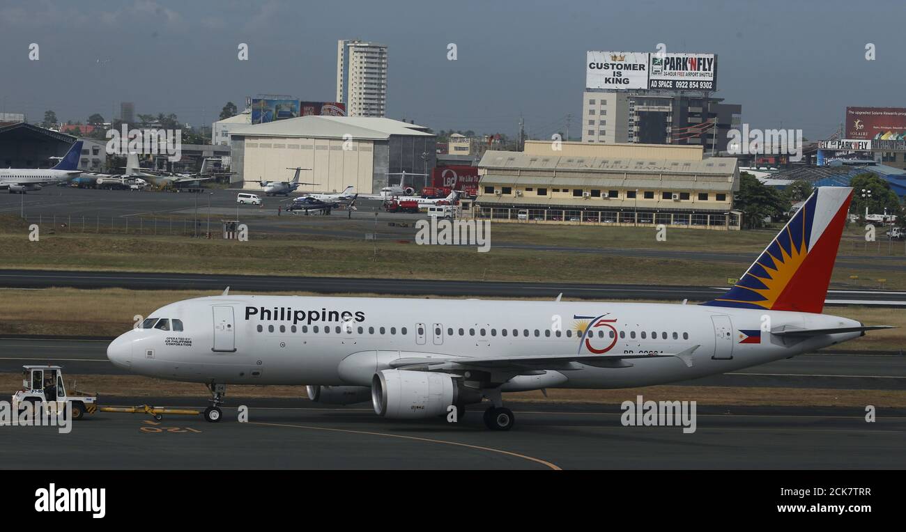 A Philippine Airlines passenger jet is pictured at the tarmac of Terminal 3 at the Ninoy Aquino International aiport in Pasay city, Metro Manila Philippines April 1, 2016. REUTERS/Erik De Castro Stock Photo
