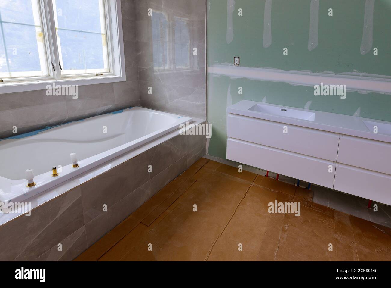 Master Bathroom with new under construction bathroom interior drywall