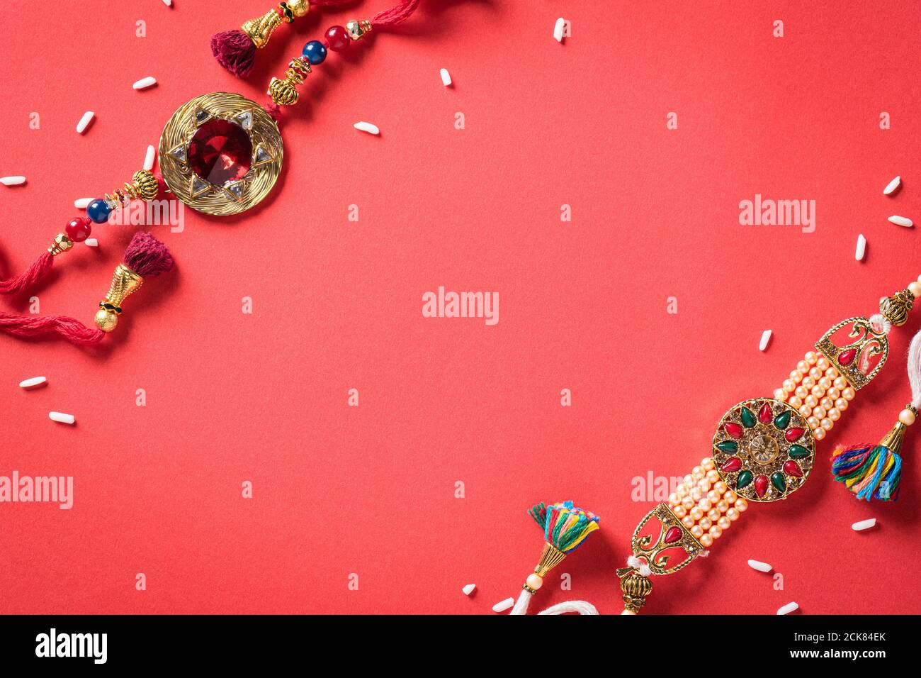 Raksha Bandhan Indian festival with beautiful Rakhi and Rice