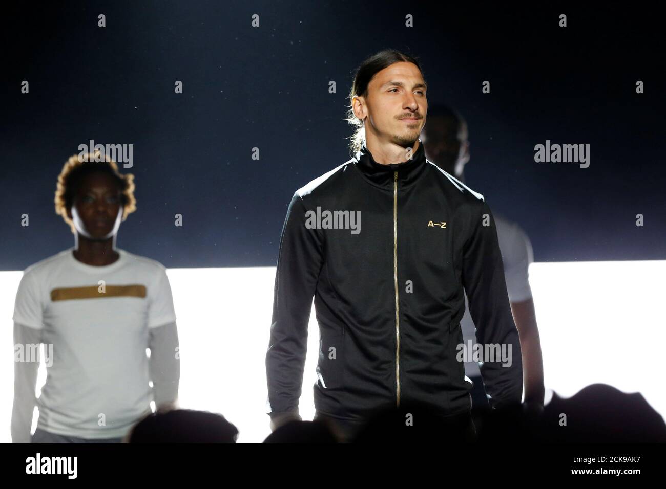 Soccer player Zlatan Ibrahimovic stands near models as he launches his A-Z  brand of sportswear in Paris, France, June 7, 2016. REUTERS/John Schults  Stock Photo - Alamy