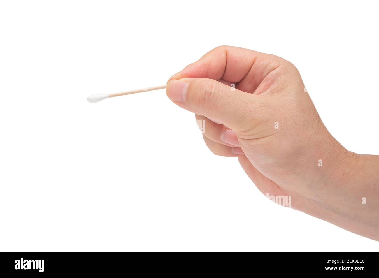 Close-up of a man's hand holding a cotton swab on a white background. Stock Photo