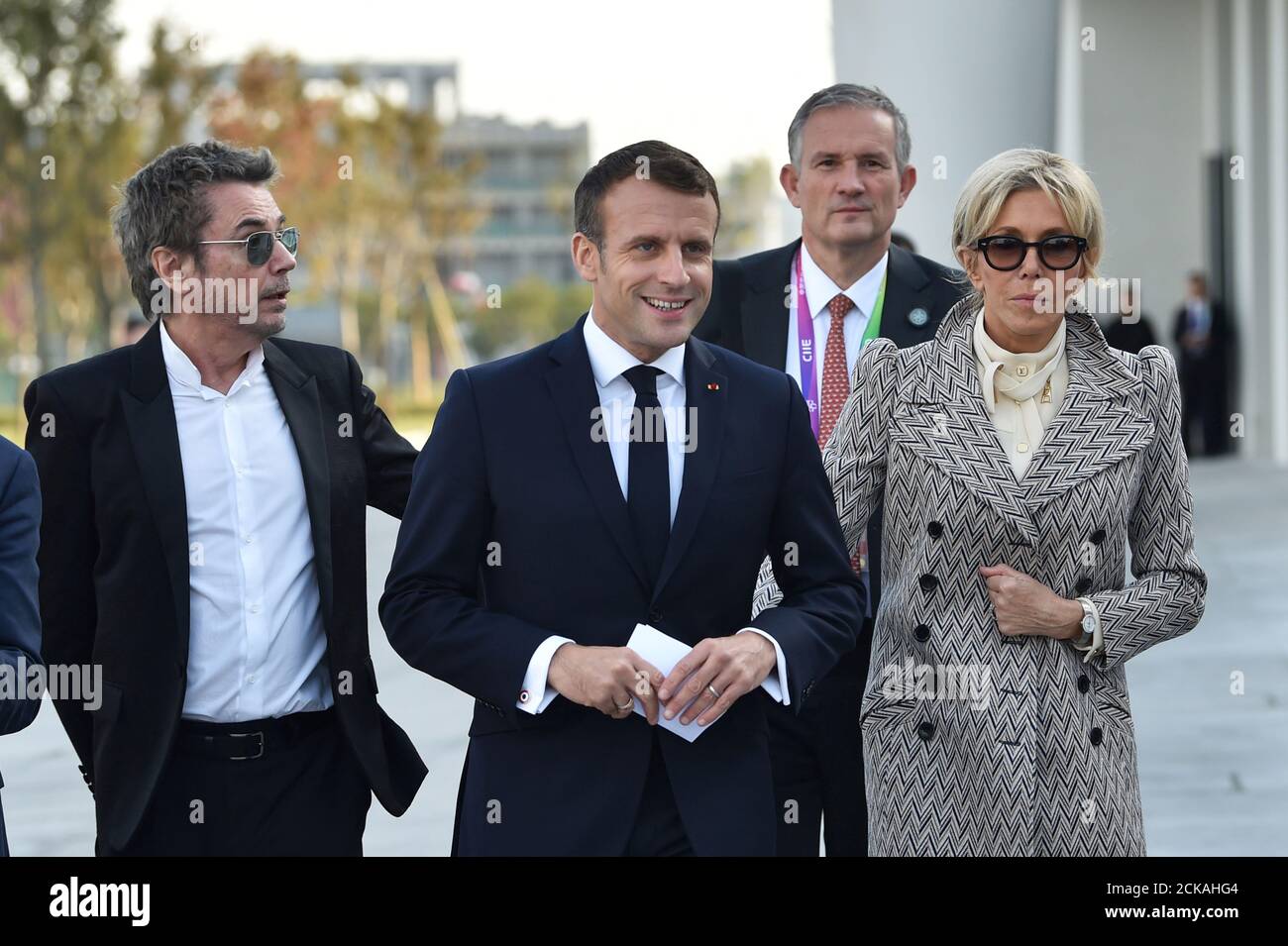 French President Emmanuel Macron, First Lady Brigitte Macron and Jean Michel  Jarre arrive for the inauguration of Centre Pompidou West Bund Museum in  Shanghai, China November 5, 2019. Hector Retamal/Pool via REUTERS