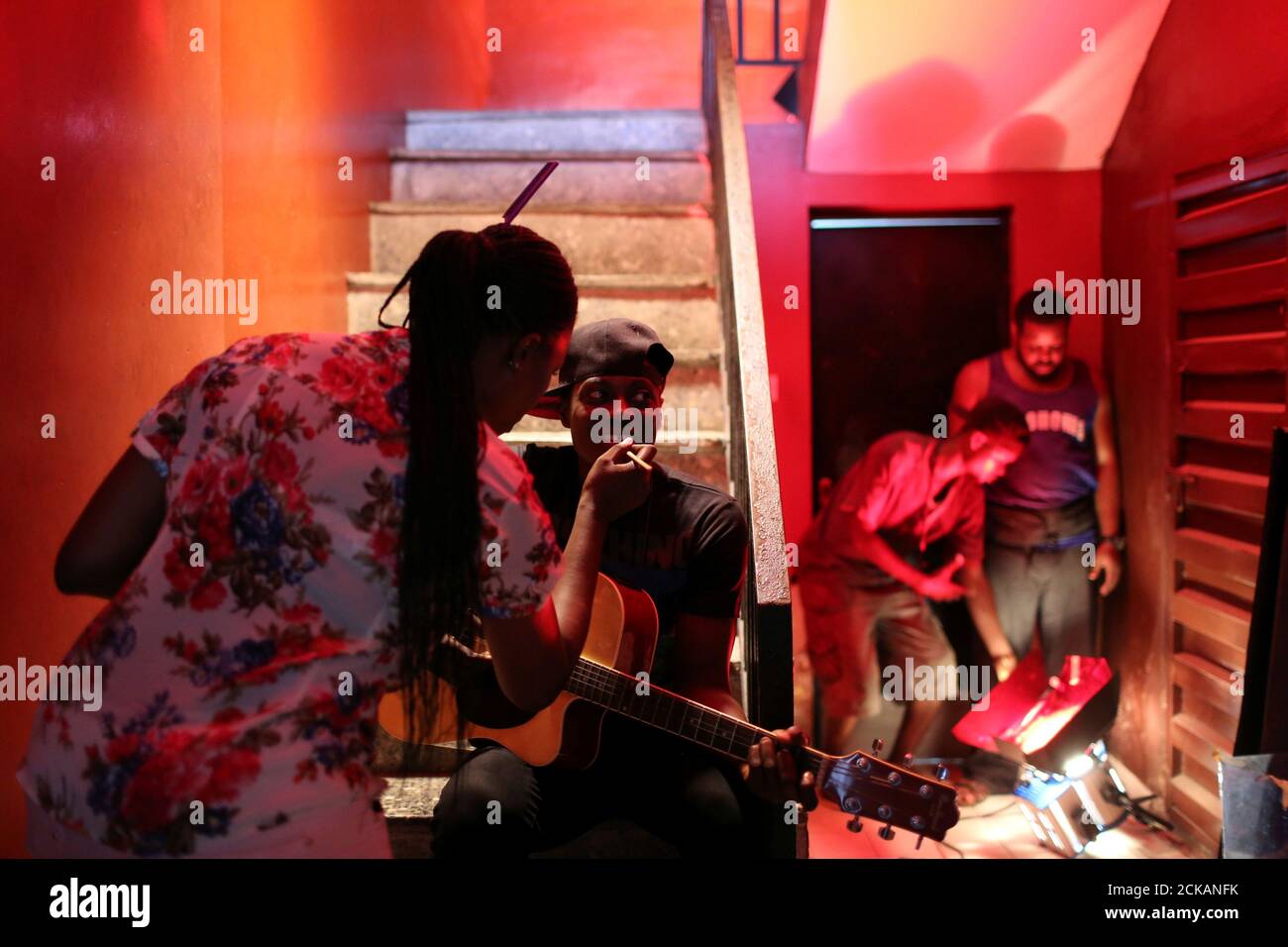 A Makeup Artists Applies Makeup On Artist Sound Sultan On Set During The Music Video Shoot For Sound Sultan S Song Hello Baale Directed By Kemi Adetiba In The Festac District Of Lagos