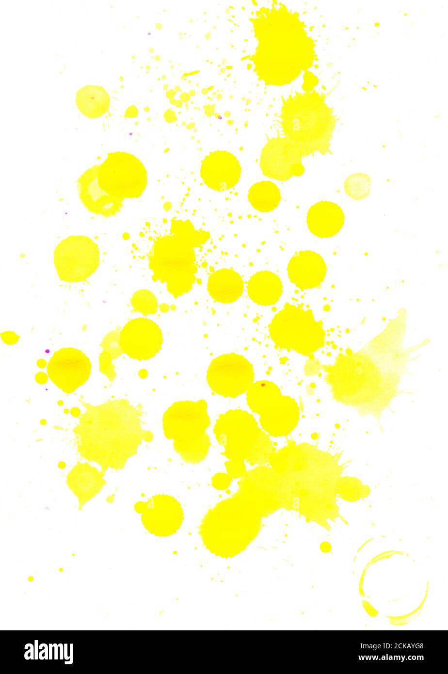 yellow drops water color spread on white paper for abstract artwork  background Stock Photo - Alamy
