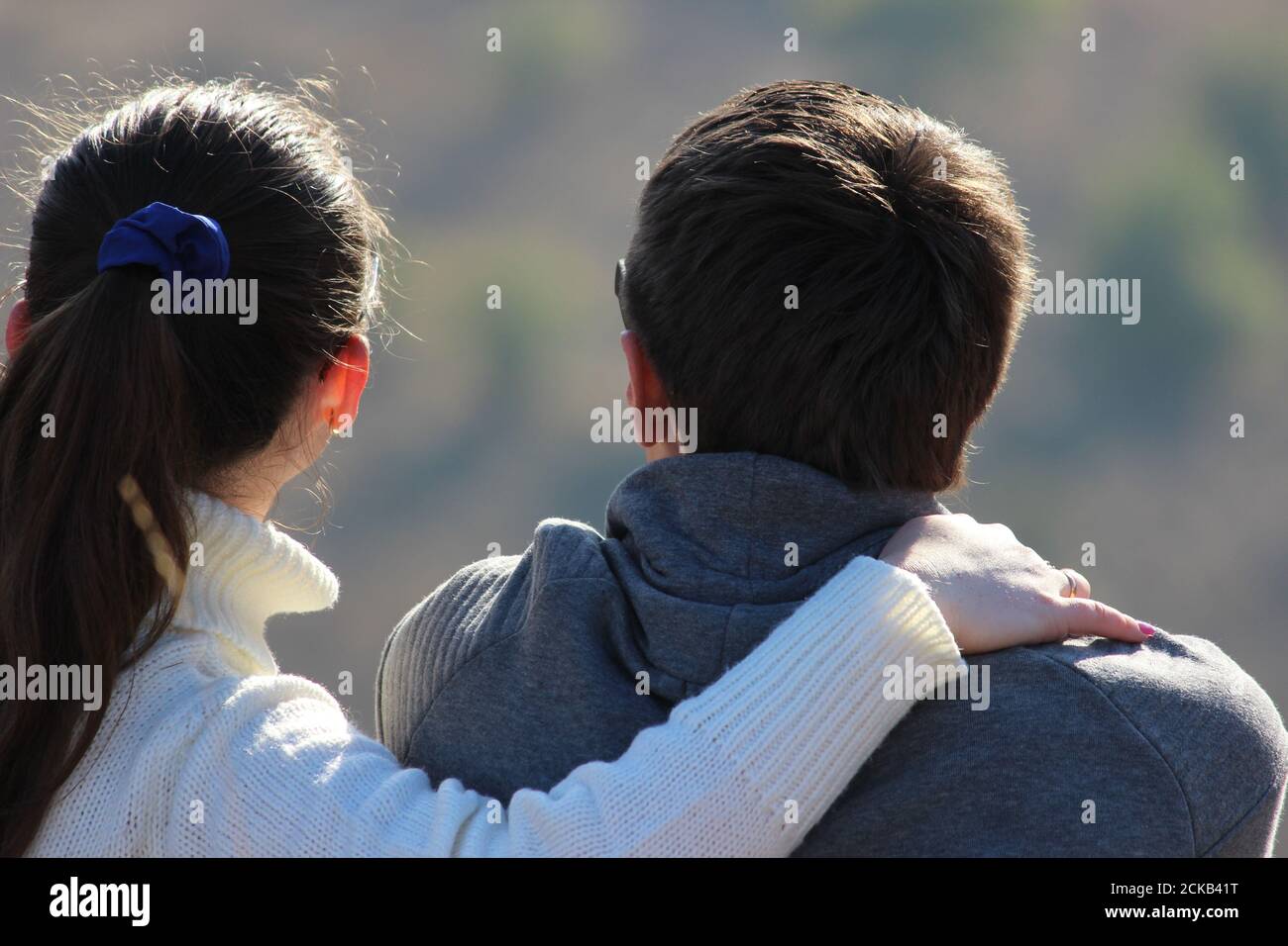 Girl and guy kind of from the back. Stock Photo
