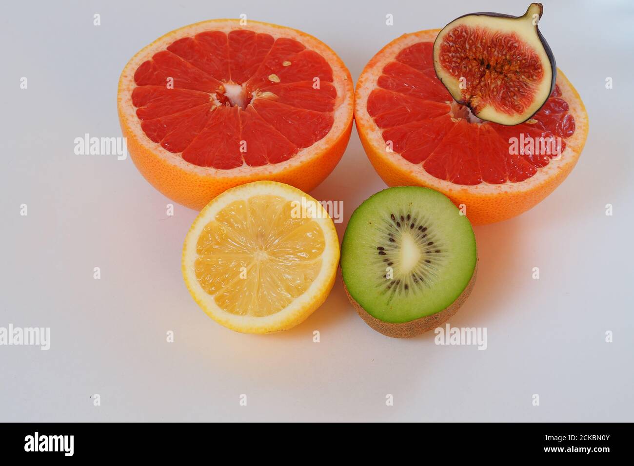 Citrus and exotic fruits cut in half Stock Photo Alamy