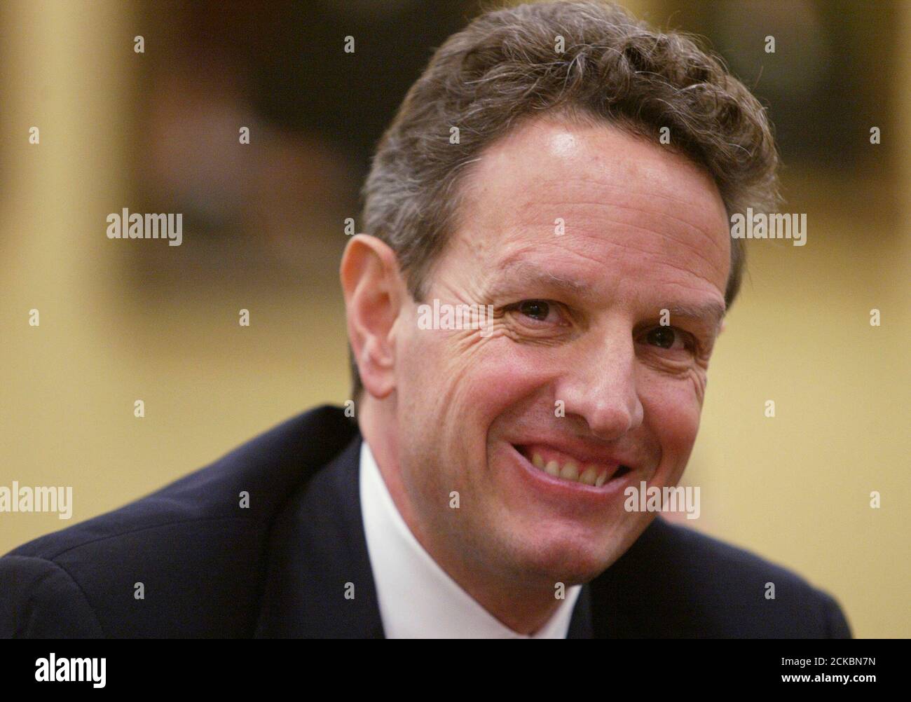 U.S. Treasury Secretary Timothy Geithner smiles as he testifies about the Obama administration's budget proposals and goals for economic recovery and reform before the House Appropriations Subcommittee on General Government and Financial Services on Capitol Hill in Washington, May 21, 2009. Geithner said that a bailout for banks was steadying the financial system but care must be taken to ensure that normal market forces are allowed to operate.  REUTERS/Jim Bourg   (UNITED STATES POLITICS BUSINESS) Stock Photo
