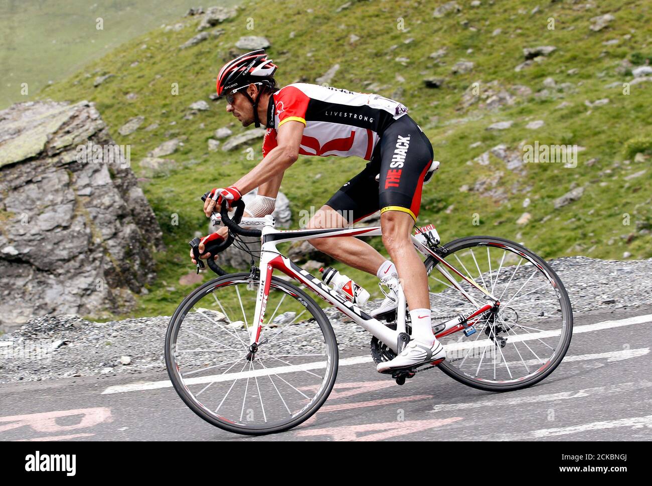 Radioshack rider Andreas Kloden of Germany climbs the mountain during the  12th stage of the Tour de France 2011 cycling race from Cugnaux to  Luz-Ardiden July 14, 2011. Euskaltel-Euskadi team rider Samuel