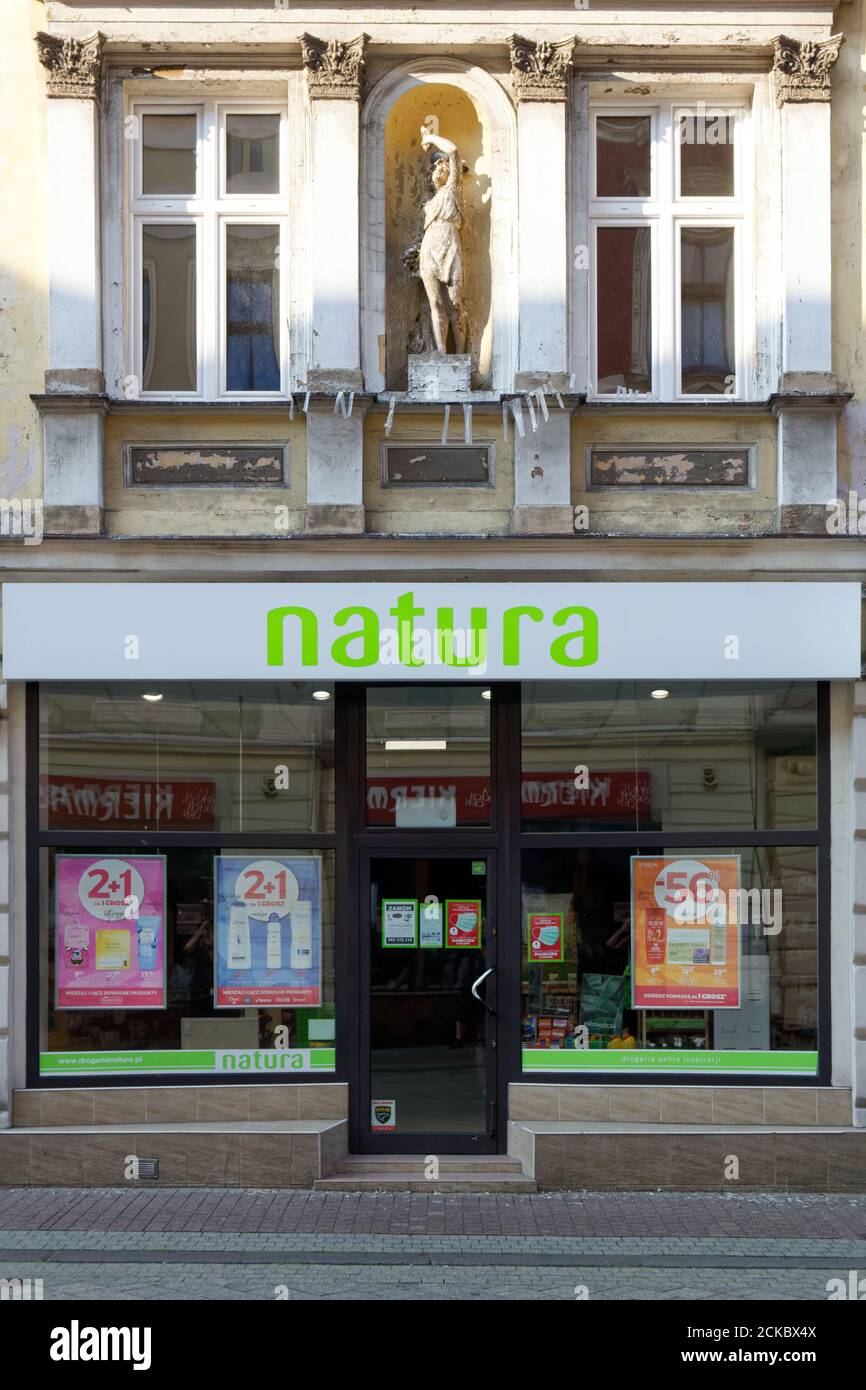 Drugstore chain shop in an old building with ornate facade Stock Photo